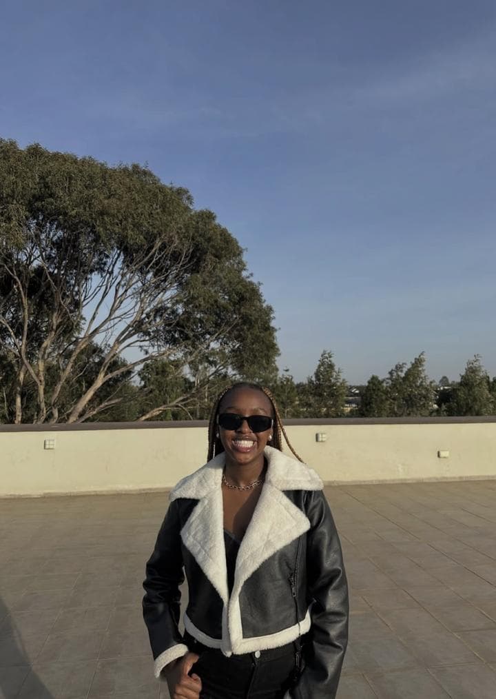 Flavia in a black shearling jacket