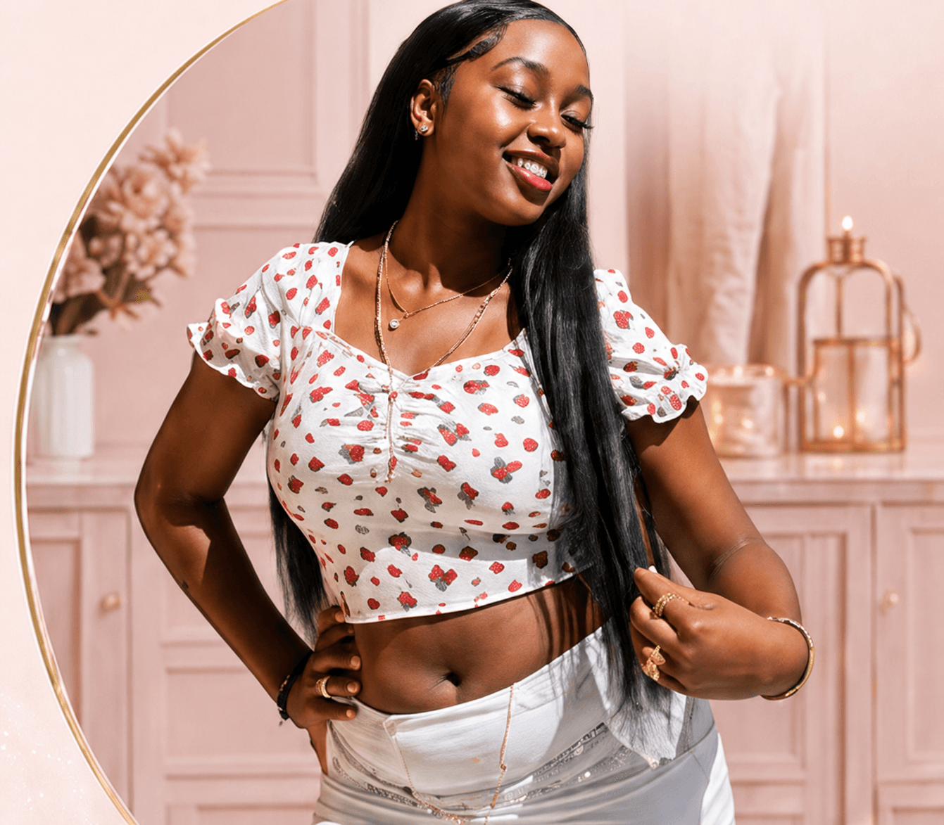 Princess Flavia smiling in a floral fashion look in a blush editorial interior